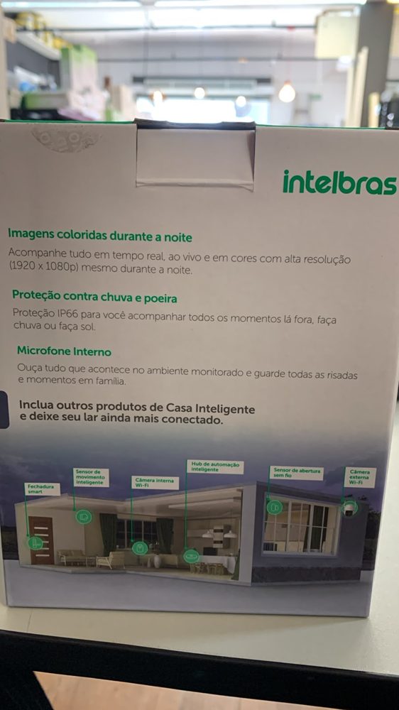 Lateral da caixa da iM7S com imagens coloridas à noite